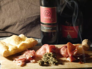 Schiacciata, prosciutto, and a selection of Tuscan wines.