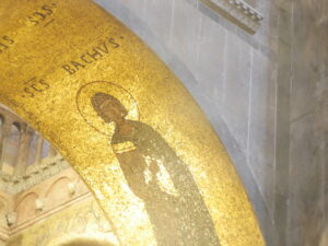A golden mosaic in Byzantine style on display in Venice, Italy.
