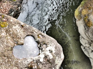 A hart eroded into the stone alongside a small river outside of Akiu Onsen in Japan.